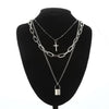 Layered Silver Chain Necklace with Cross and Lock Pendants - InnovatoDesign